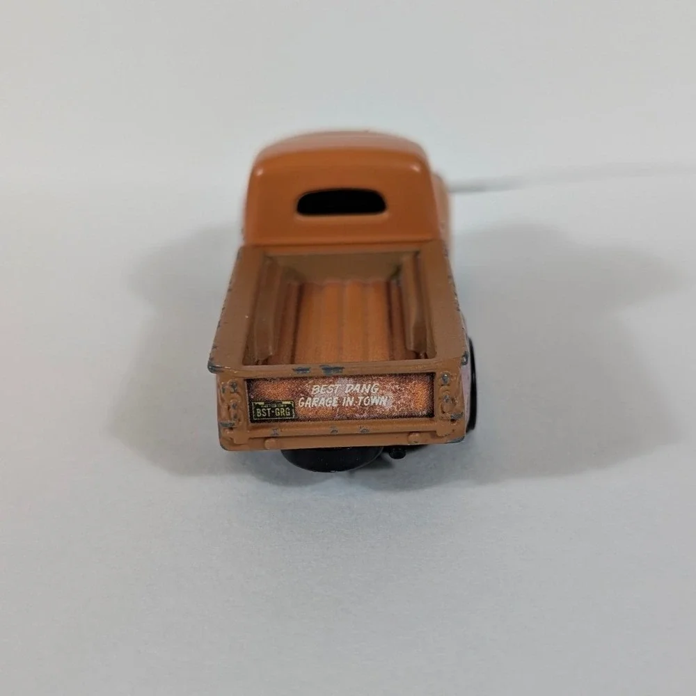 Disney Pixar Cars Smokey Diecast Truck Mattel DXV37 Orange Piston Cup Racing